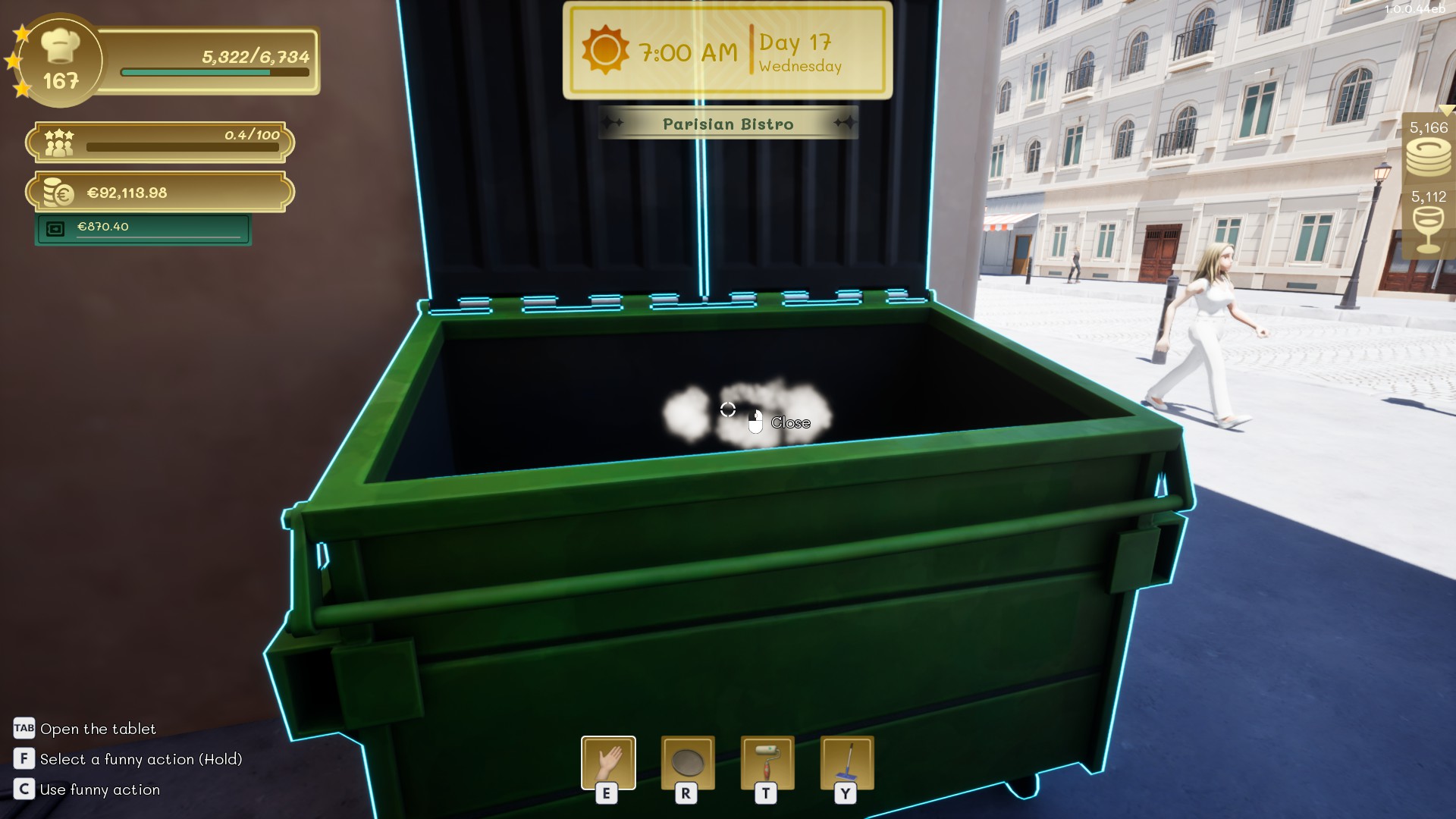 Trash bag being placed in the dumpster